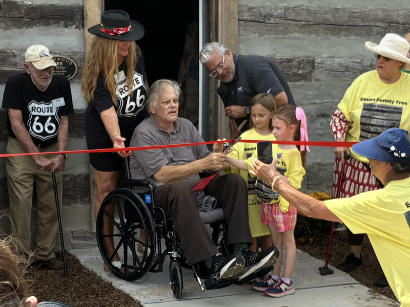 Carl Cutting the Ribbon
