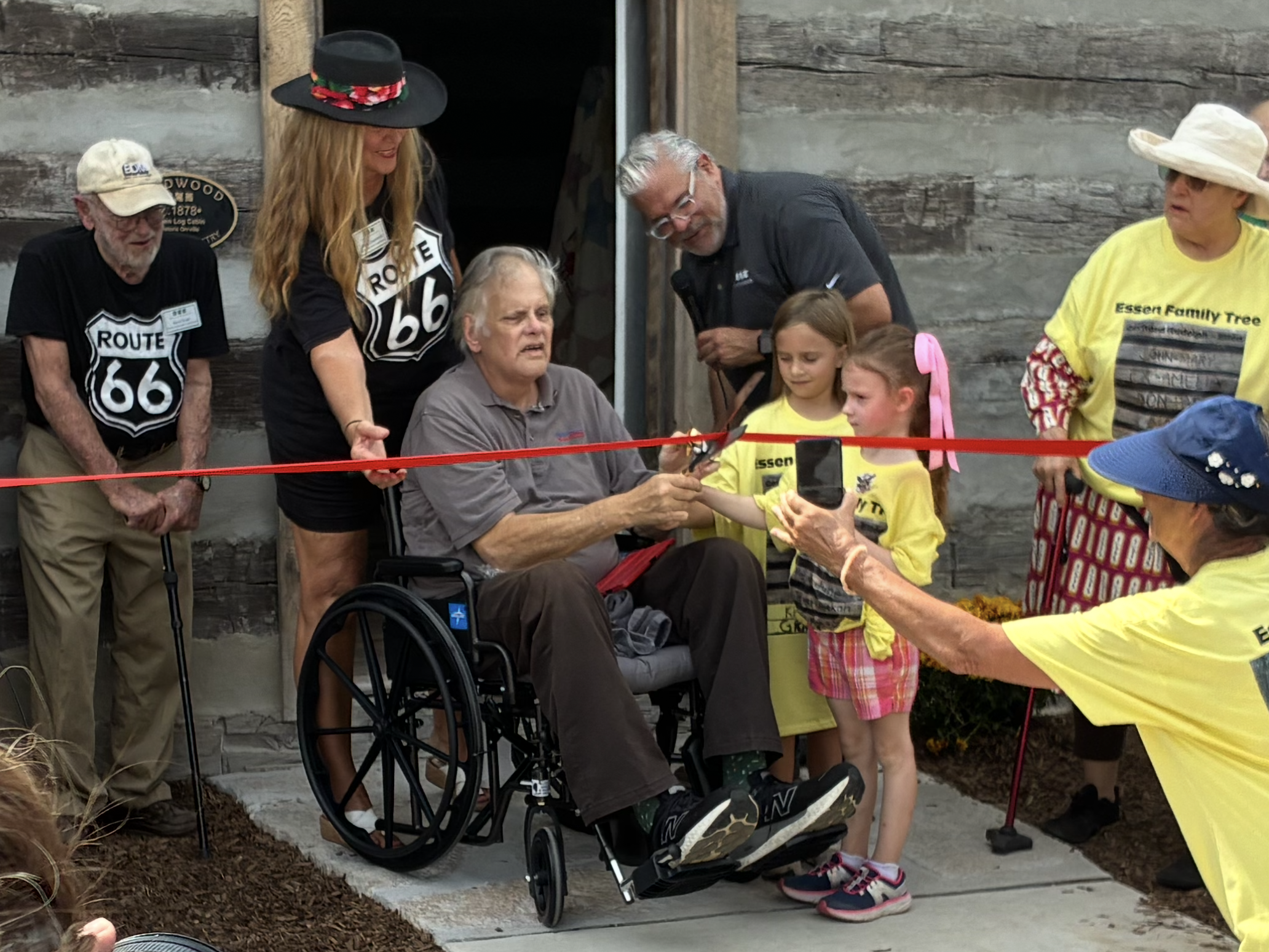 Carl Cutting the Ribbon